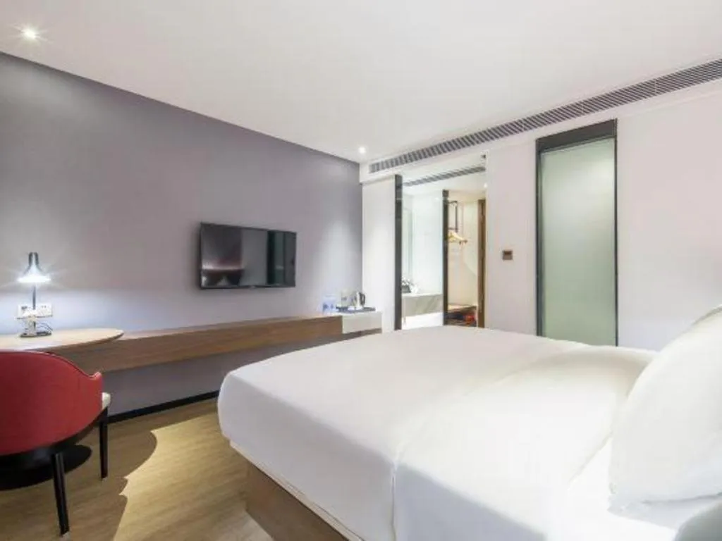 Bed in Borrman Hotel Wuzhou Teng County