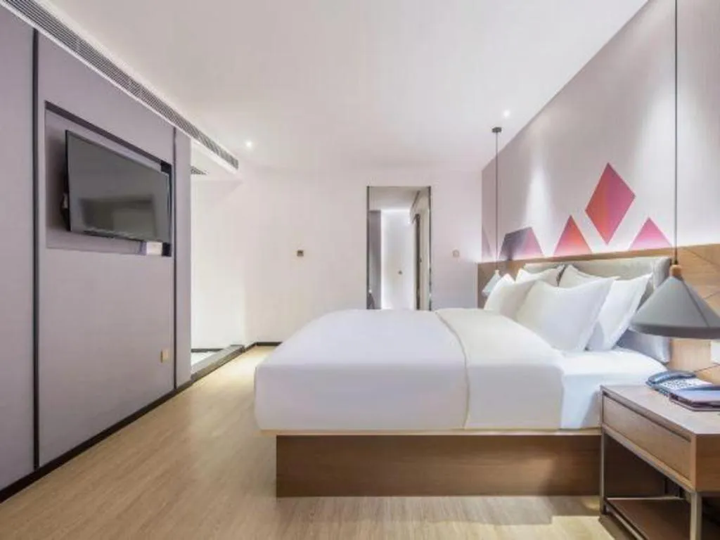 Bed in Borrman Hotel Wuzhou Teng County