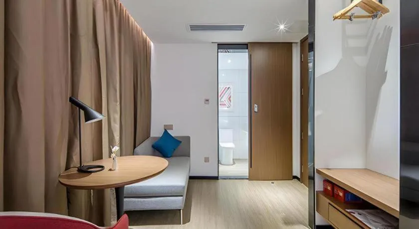 Bed in Borrman Hotel Wuzhou Teng County