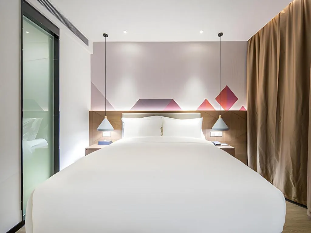 Bed in Borrman Hotel Wuzhou Teng County