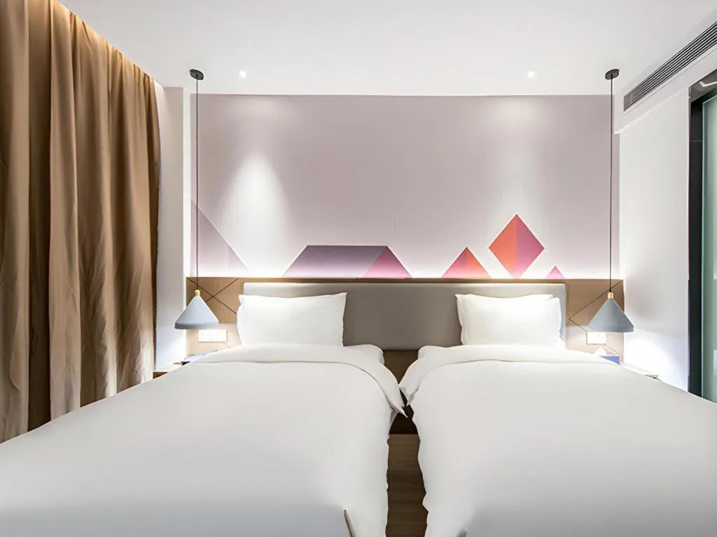 Bed in Borrman Hotel Wuzhou Teng County