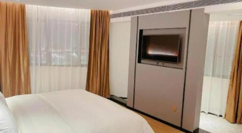 Bed in Borrman Hotel Wuzhou Teng County