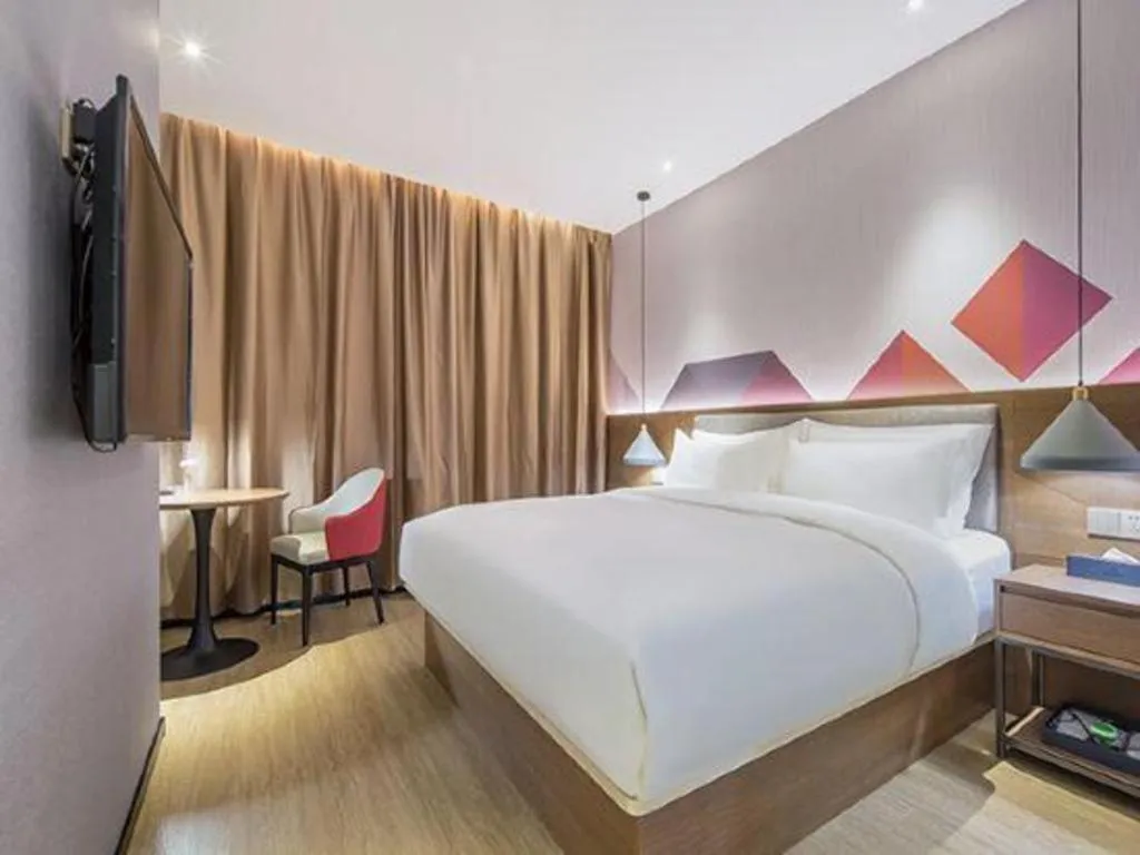 Bed in Borrman Hotel Wuzhou Teng County