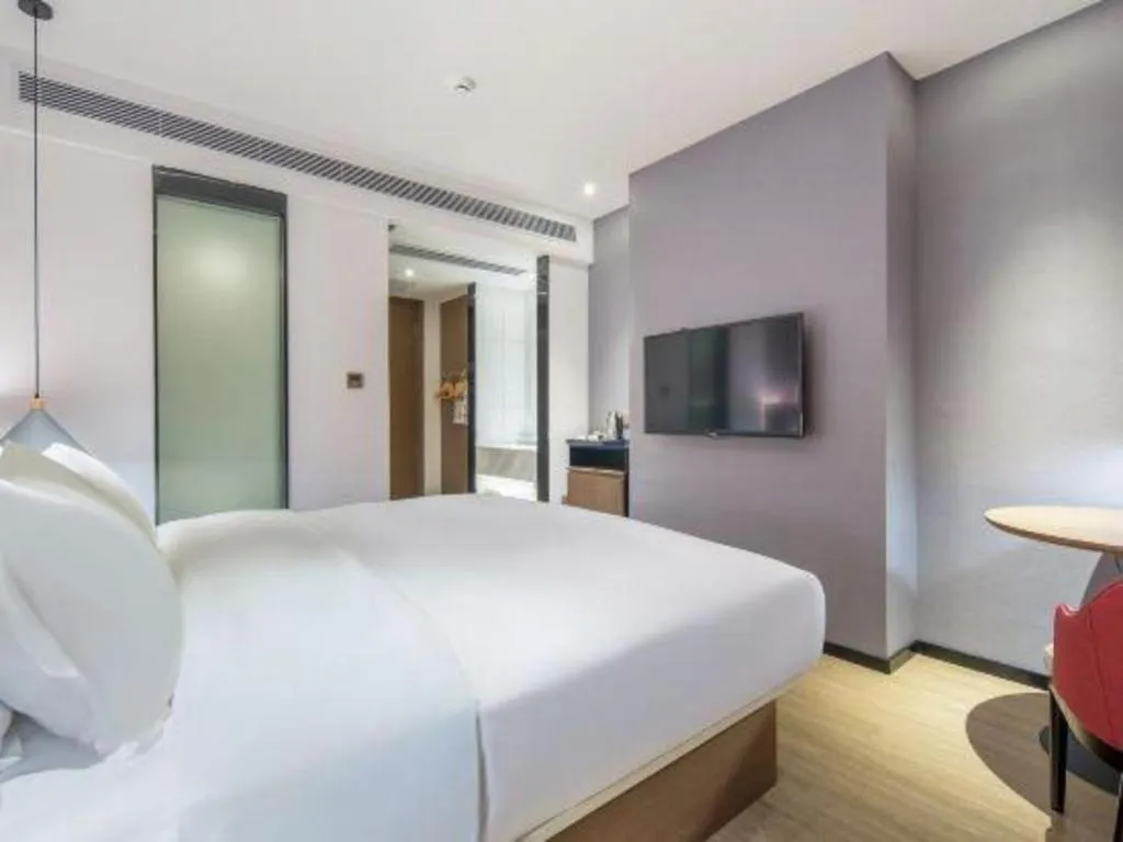 Bed in Borrman Hotel Wuzhou Teng County