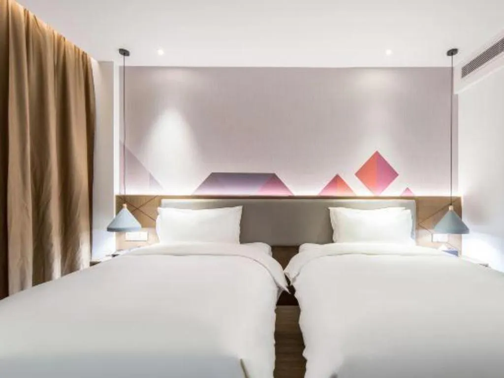 Bed in Borrman Hotel Wuzhou Teng County