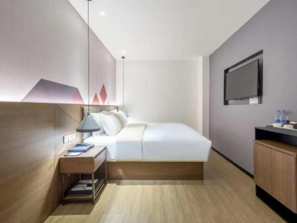 Bed in Borrman Hotel Wuzhou Teng County