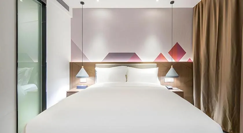 Bed in Borrman Hotel Wuzhou Teng County