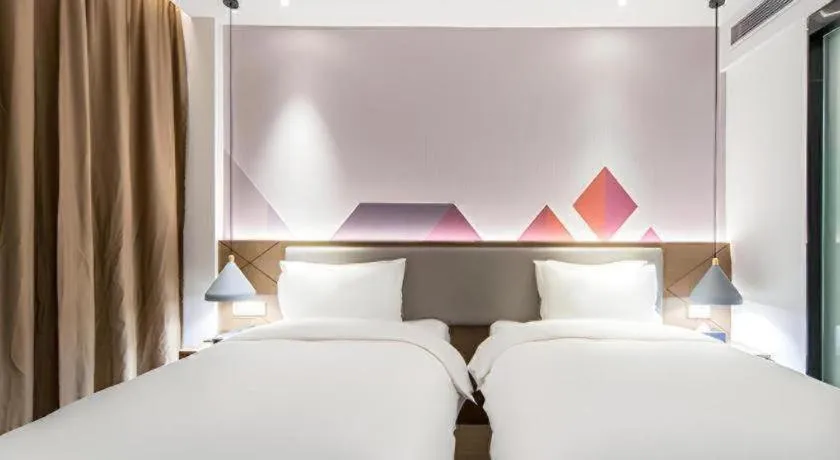 Bed in Borrman Hotel Wuzhou Teng County