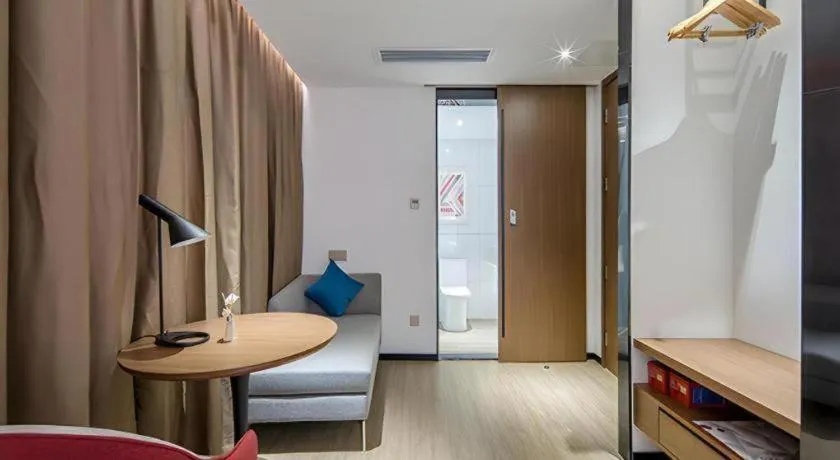 Bed in Borrman Hotel Wuzhou Teng County