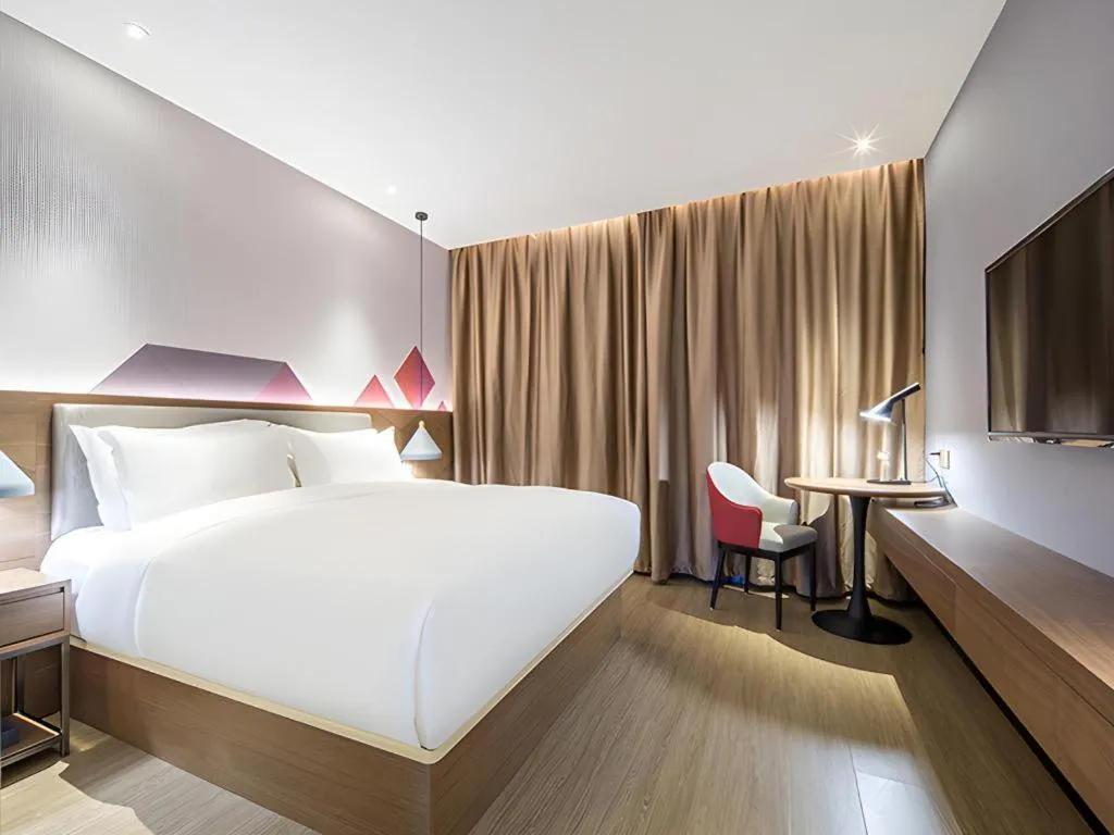 Bed in Borrman Hotel Wuzhou Teng County
