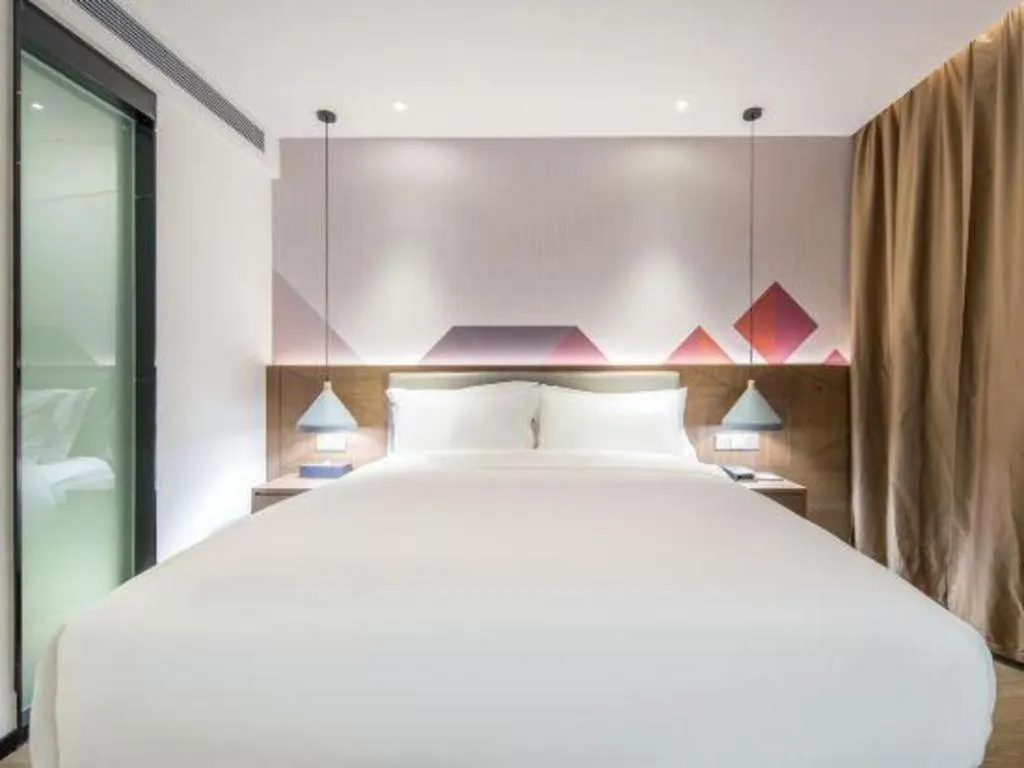 Bed in Borrman Hotel Wuzhou Teng County