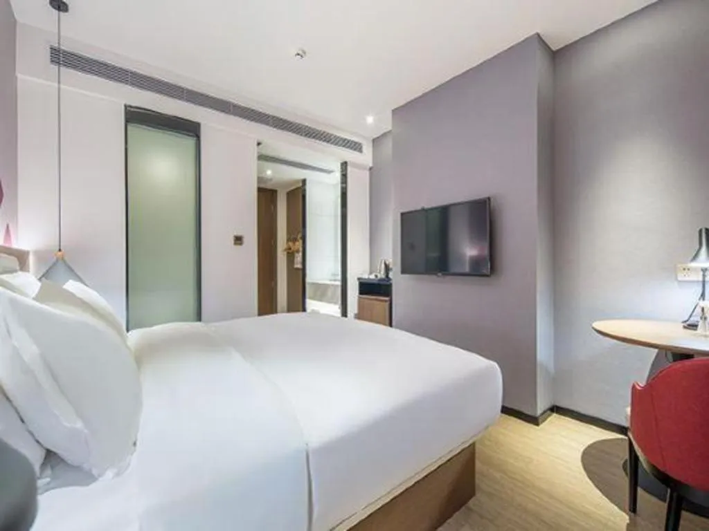 Bed in Borrman Hotel Wuzhou Teng County