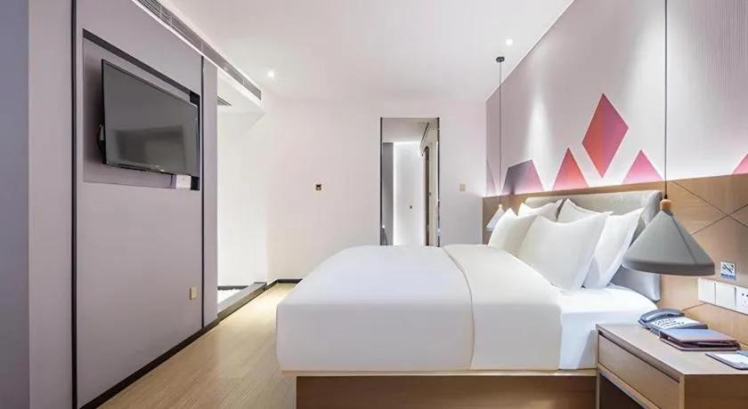 Bed in Borrman Hotel Wuzhou Teng County