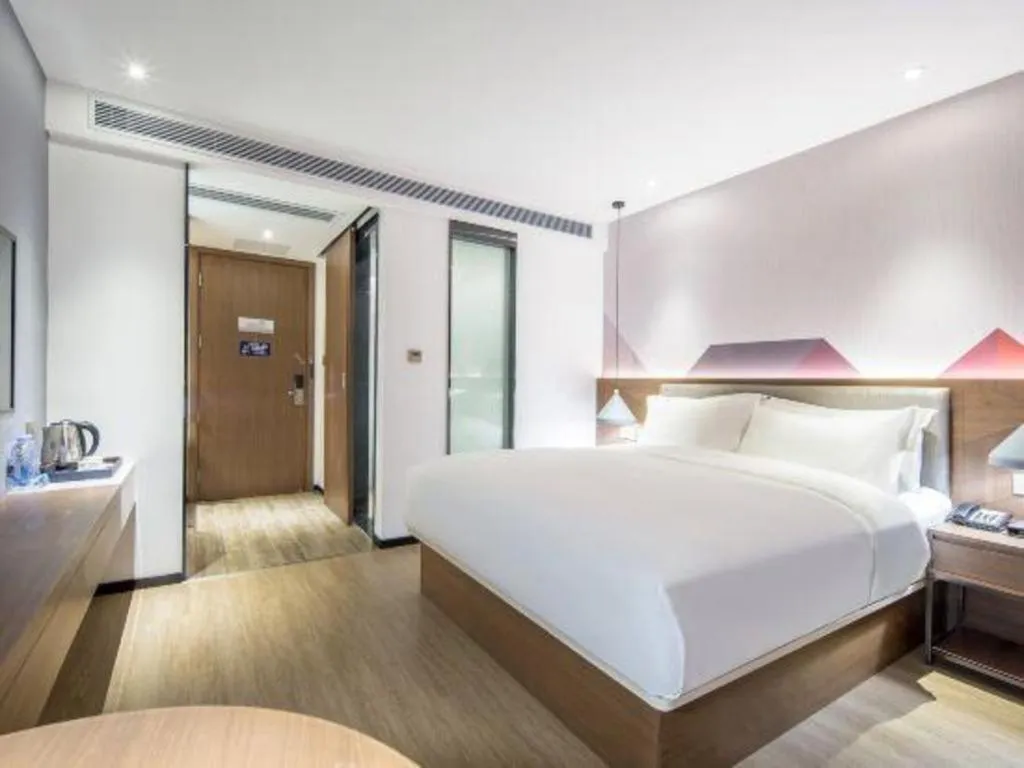 Bed in Borrman Hotel Wuzhou Teng County