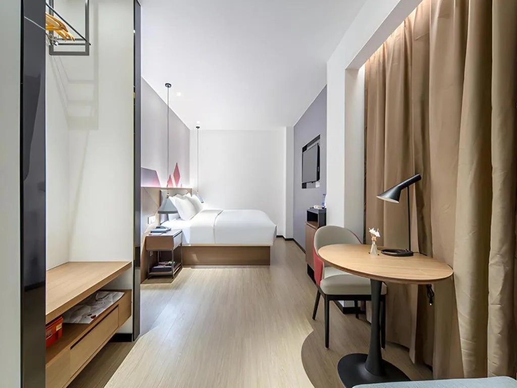 Bed in Borrman Hotel Wuzhou Teng County