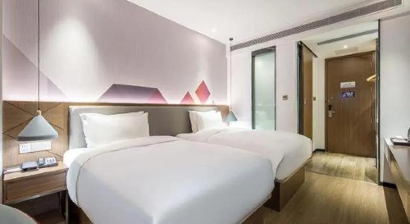 Bed in Borrman Hotel Wuzhou Teng County