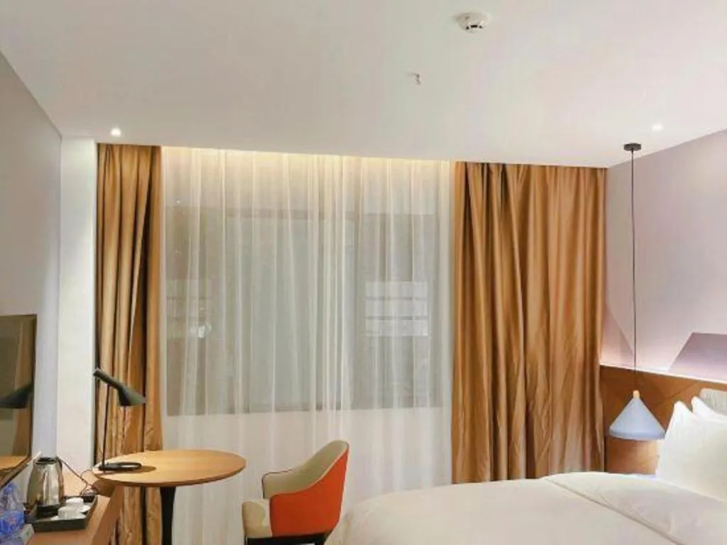 Bed in Borrman Hotel Wuzhou Teng County