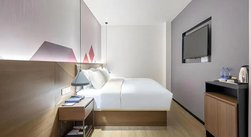 Bed in Borrman Hotel Wuzhou Teng County