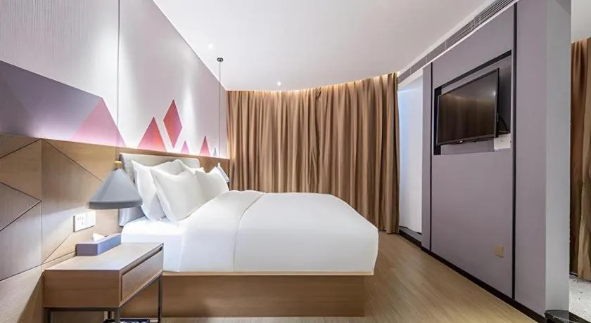 Bed in Borrman Hotel Wuzhou Teng County
