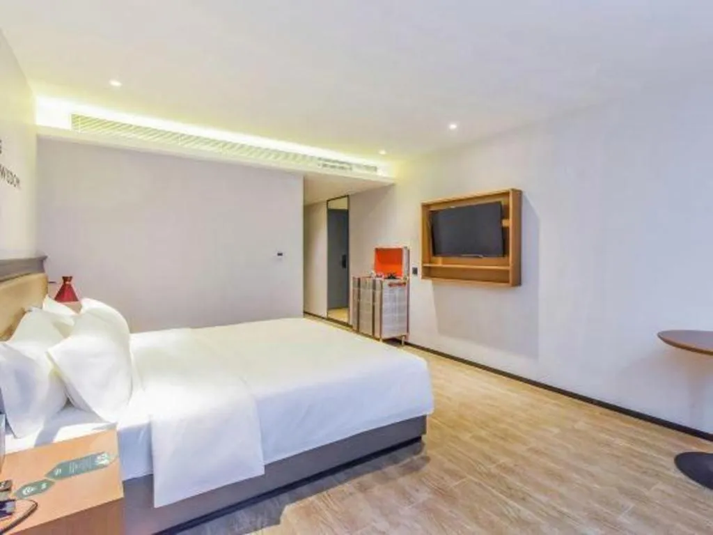 Bed in Premier City Comfort Hotel Wuhan Hankou Railway Station Changgang Road Metro Station