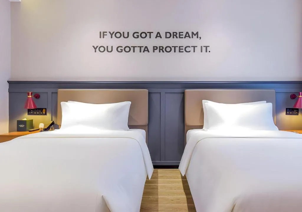 Bed in Premier City Comfort Hotel Wuhan Hankou Railway Station Changgang Road Metro Station