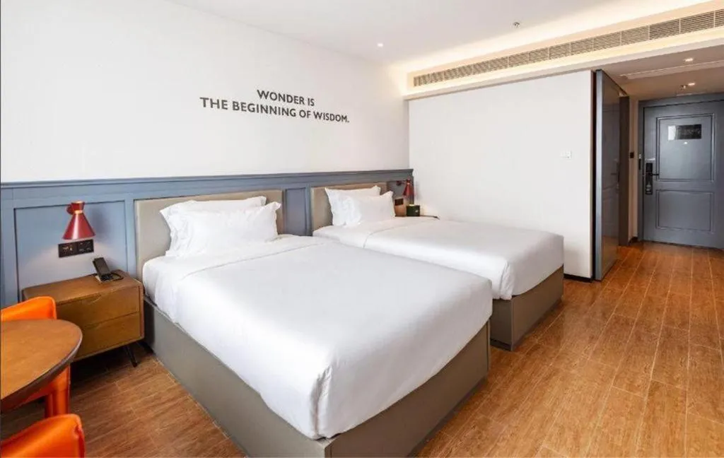 Bed in Premier City Comfort Hotel Wuhan Hankou Railway Station Changgang Road Metro Station