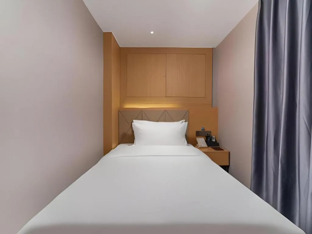 Bed in Borrman Hotel Guangzhou Shisanhang Ximenkou Metro Station