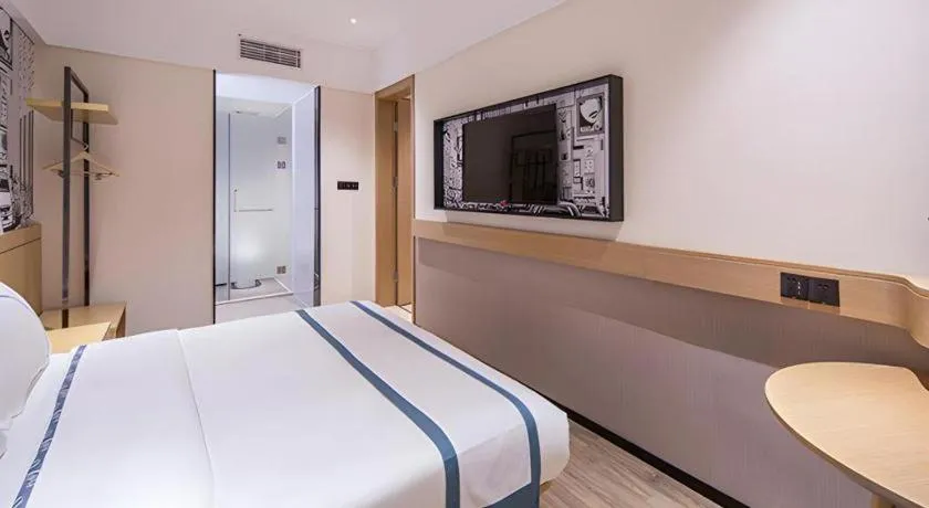 Bed in City Comfort Inn Liuzhou Liudong New District Hualing Youlinghui