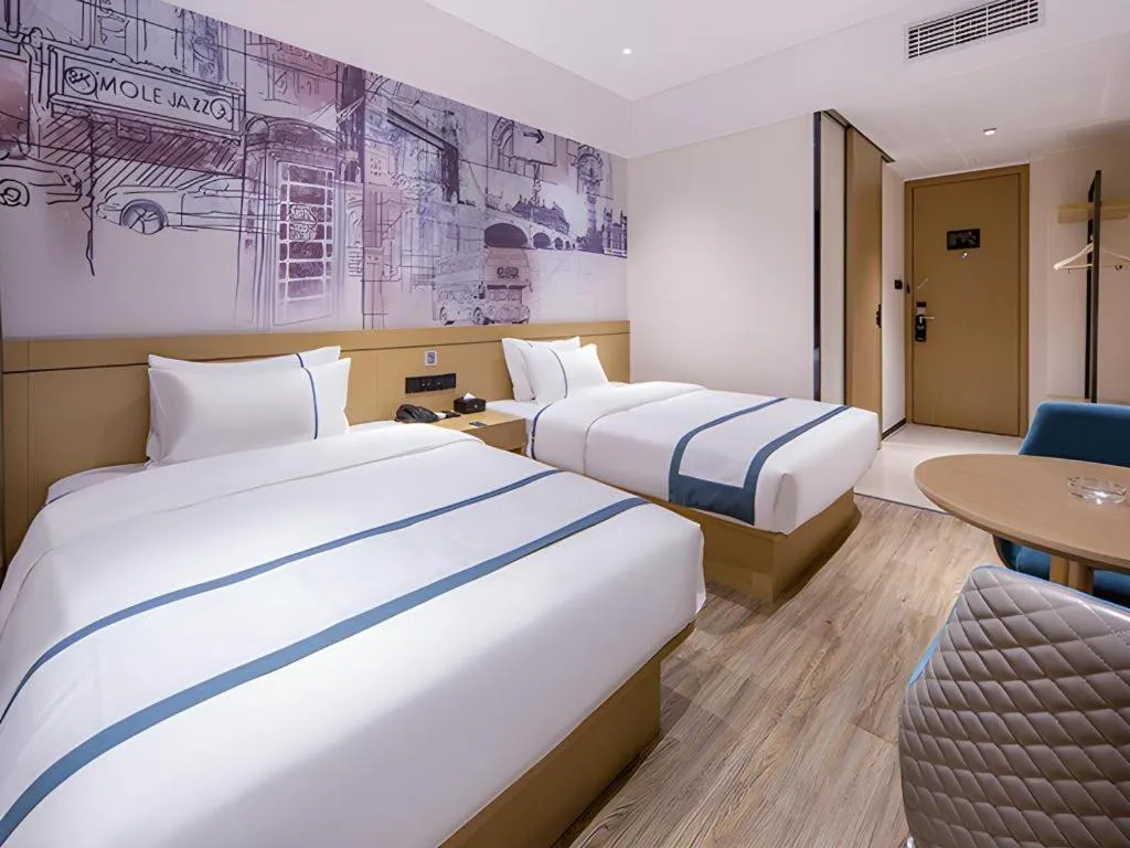 Bed in City Comfort Inn Liuzhou Liudong New District Hualing Youlinghui