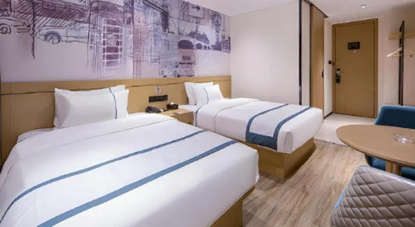 Bed in City Comfort Inn Liuzhou Liudong New District Hualing Youlinghui