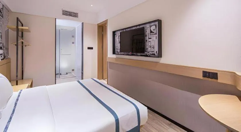 Bed in City Comfort Inn Liuzhou Liudong New District Hualing Youlinghui
