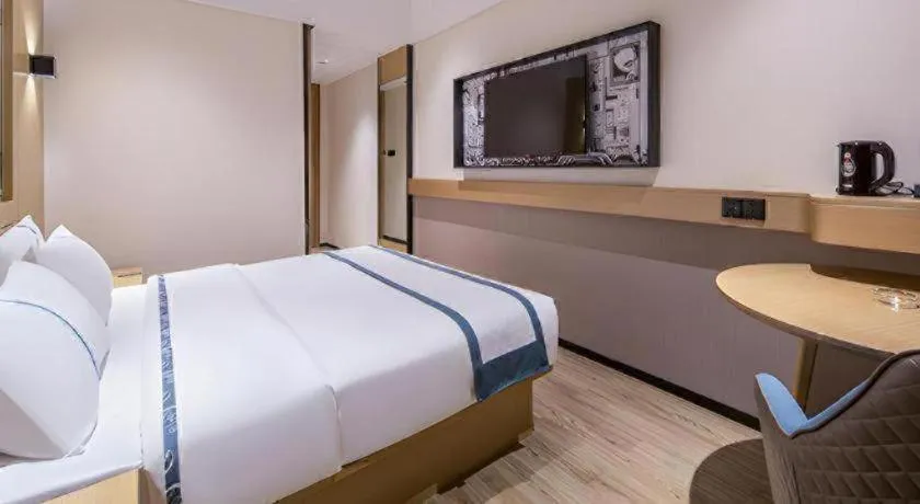 Bed in City Comfort Inn Liuzhou Liudong New District Hualing Youlinghui