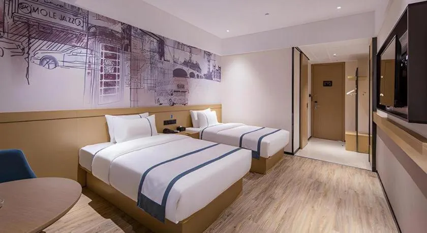 Bed in City Comfort Inn Liuzhou Liudong New District Hualing Youlinghui