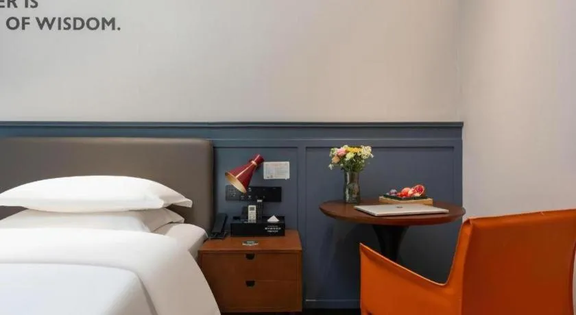 Bed in City Comfort Premier Hotel Liuzhou Wuxing Pedestrian Street Jinggu Building