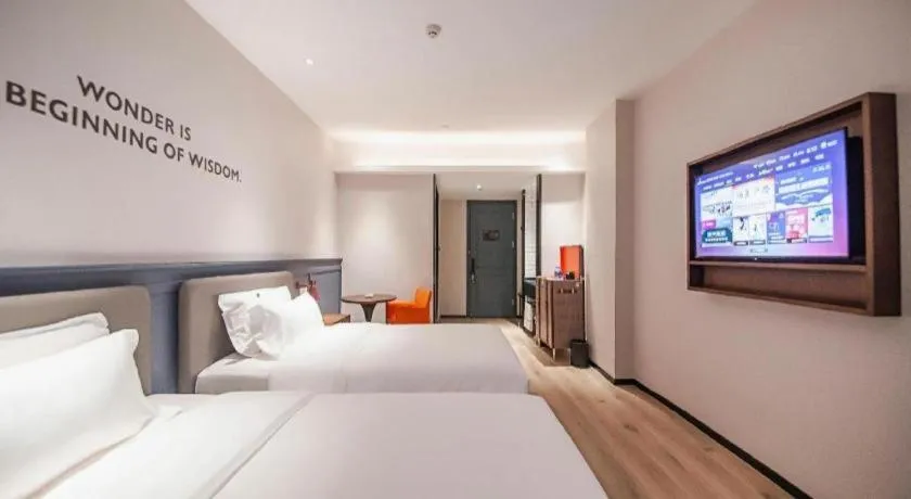 Bed in City Comfort Premier Hotel Liuzhou Wuxing Pedestrian Street Jinggu Building