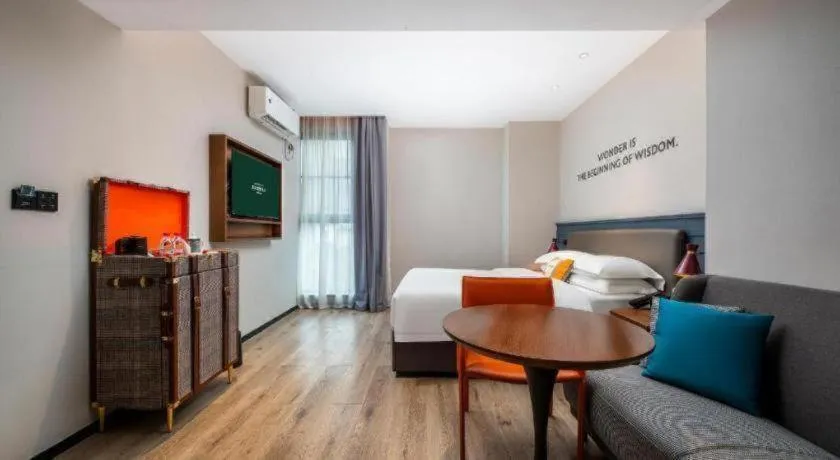 Bed in City Comfort Premier Hotel Liuzhou Wuxing Pedestrian Street Jinggu Building
