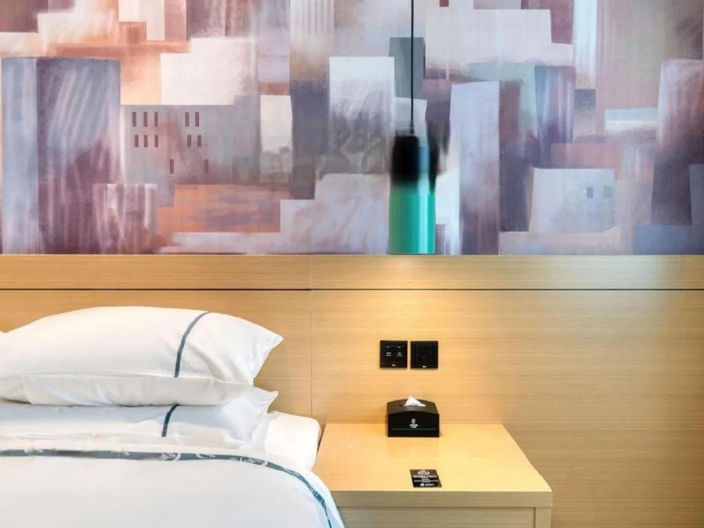 Bed in City Comfort Inn Yancheng Xihuan Road Wanda Plaza