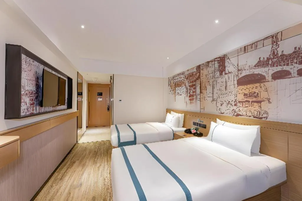 Bed in City Comfort Inn Yancheng Xihuan Road Wanda Plaza