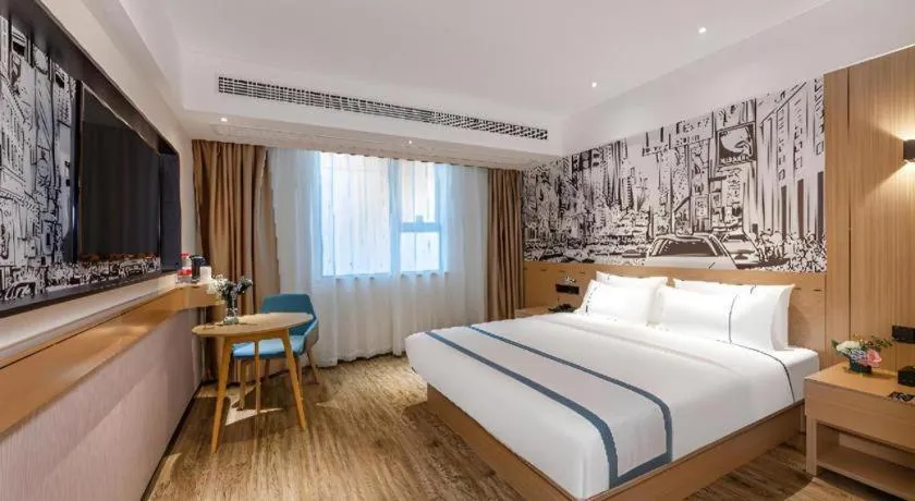 Bed in City Comfort Inn Yancheng Xihuan Road Wanda Plaza