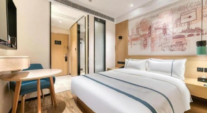 Bed in City Comfort Inn Yancheng Xihuan Road Wanda Plaza