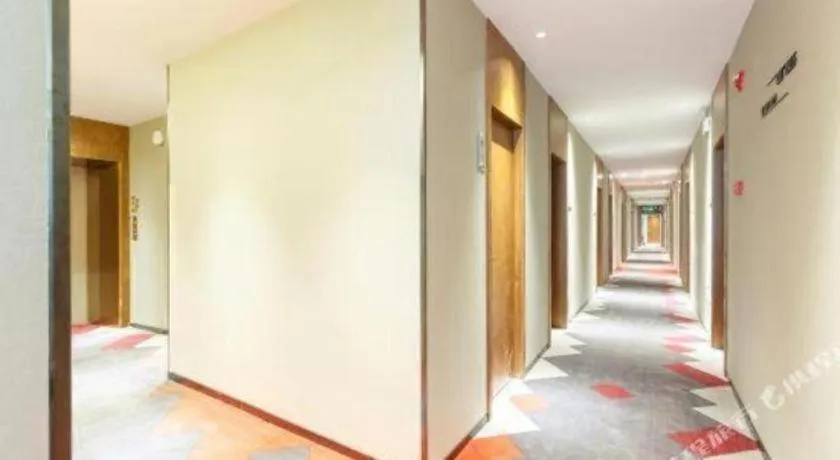 Bed in Borrman Hotel Beijing Tongzhou Universal Canal Business Zone