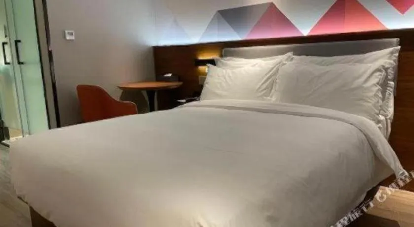 Bed in Borrman Hotel Beijing Tongzhou Universal Canal Business Zone