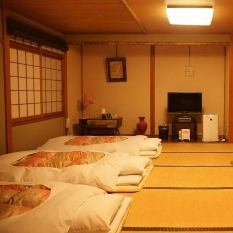 Bed in Hotel Miyoshino Annex