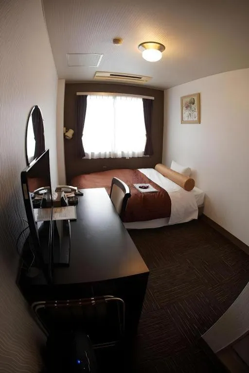 Bed in Hotel Miyoshino Annex