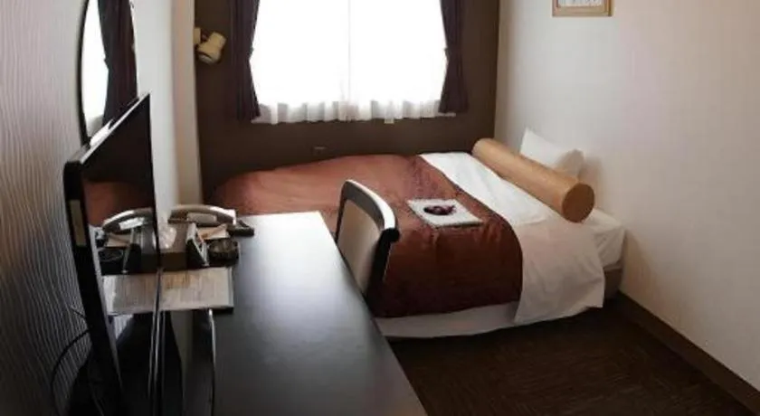 Bed in Hotel Miyoshino Annex