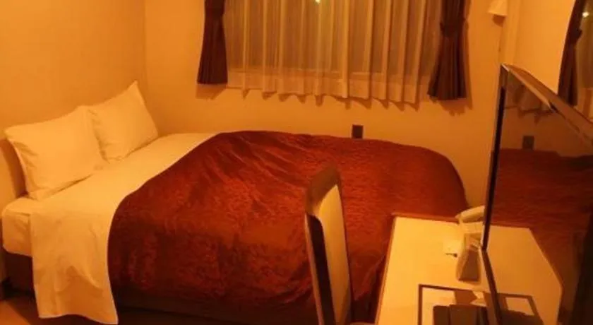 Bed in Hotel Miyoshino Annex