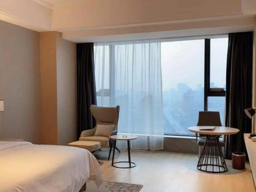 Bed in Venus Royal Hotel Anhui Tongcheng Tongguoxiushui