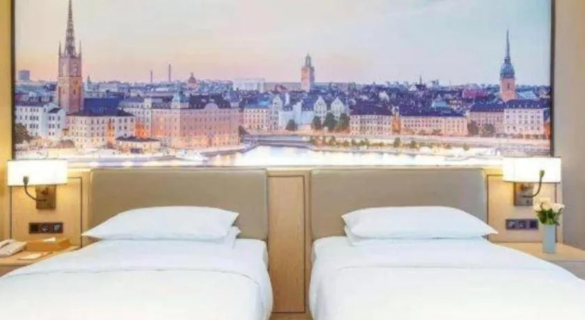 Bed in Venus Royal Hotel Anhui Tongcheng Tongguoxiushui