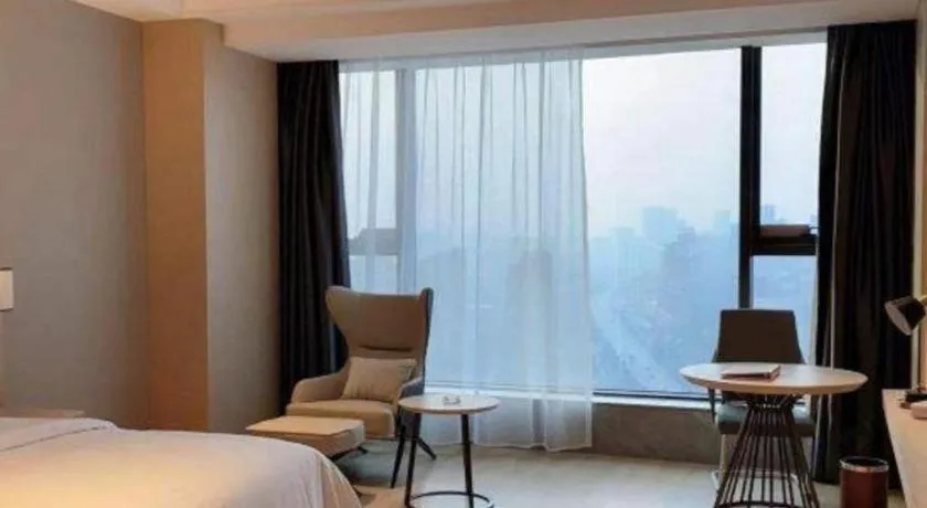 Bed in Venus Royal Hotel Anhui Tongcheng Tongguoxiushui