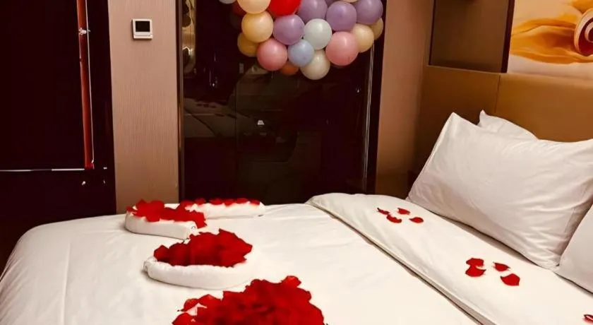 Bed in Vienna Hotel Zhengzhou East High-Speed Railway Station